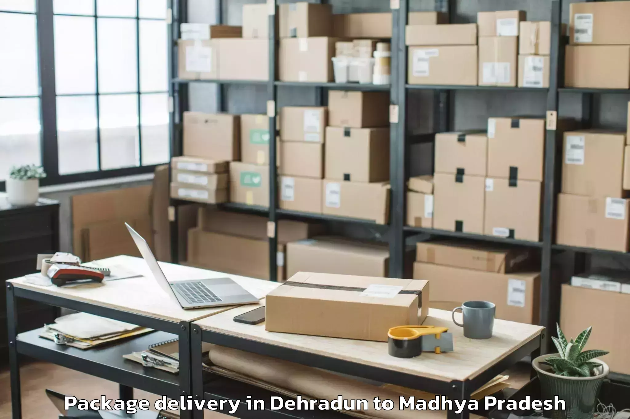 Trusted Dehradun to Iit Indore Package Delivery